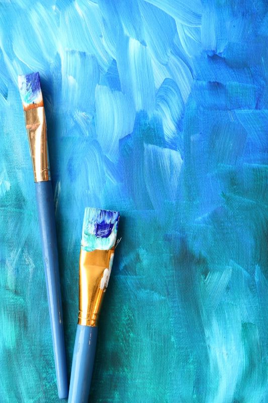 Abstract painting with paint brushes