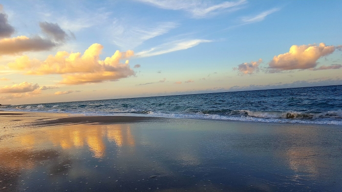 Scenic View Of Sea At Sunset