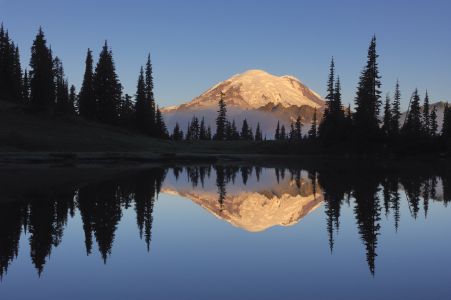Sunrise at Mt. Rainier mirrored in Tipsoo Lake.
